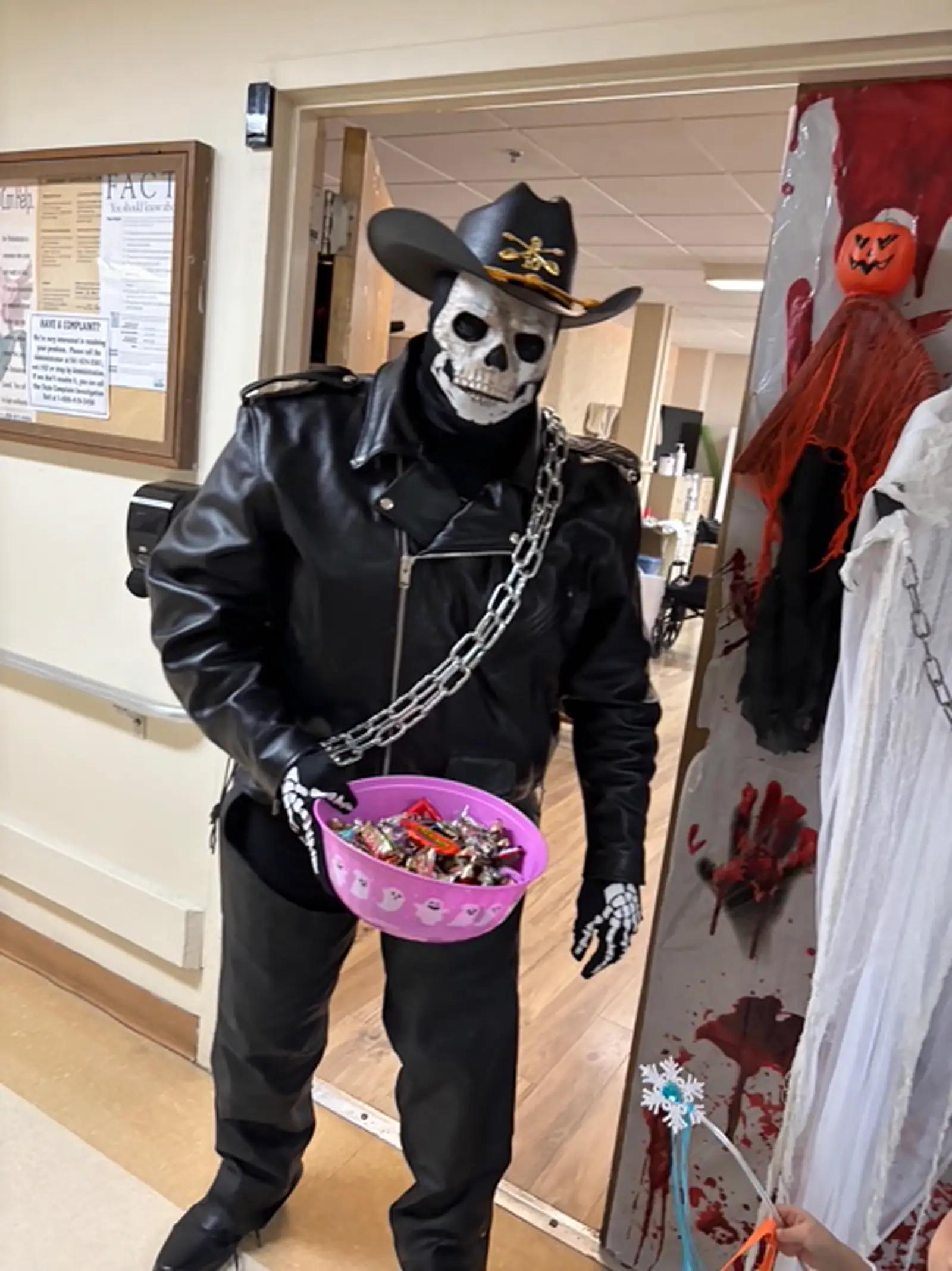 Staff in horror nun costume at Halloween event